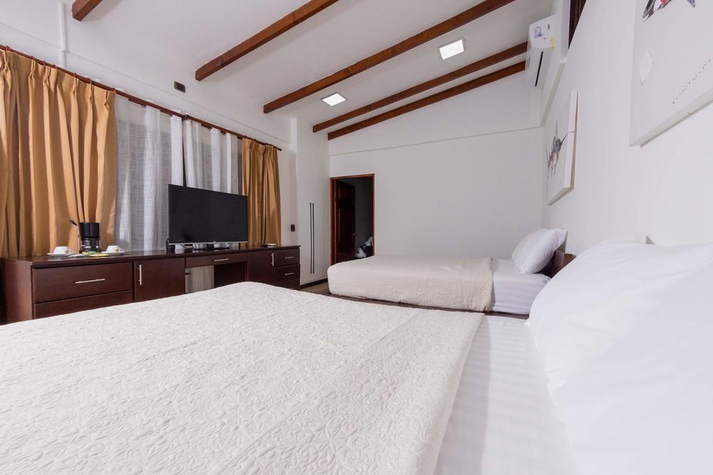 Café de Playa beach front suites Coco Exterior foto
