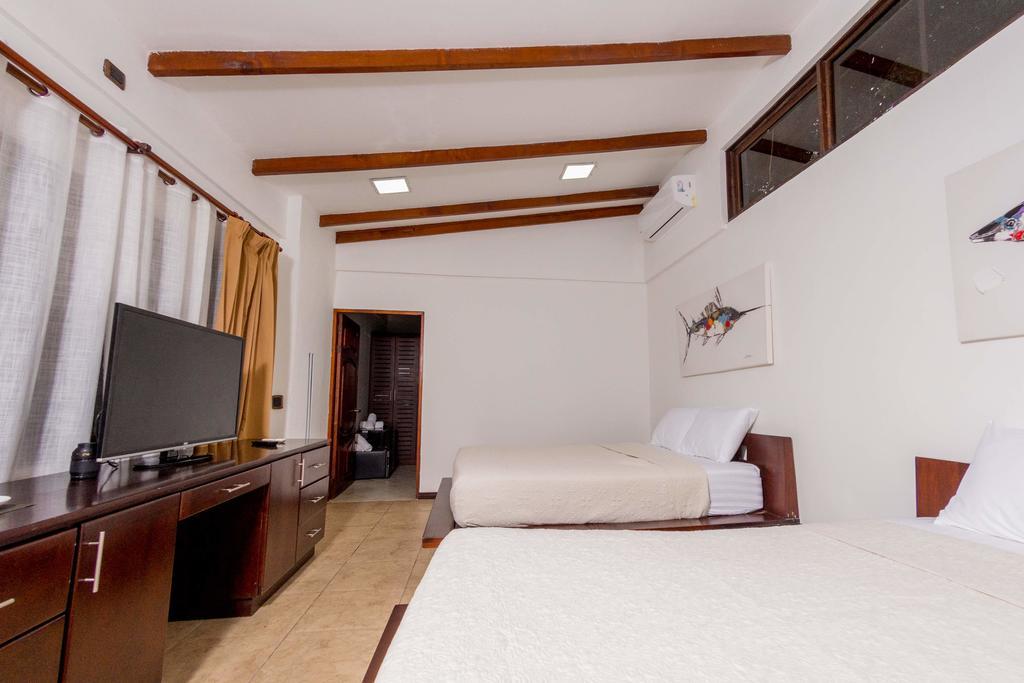 Café de Playa beach front suites Coco Exterior foto