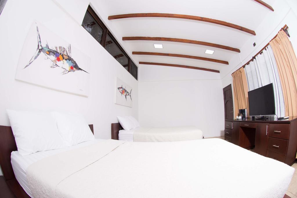 Café de Playa beach front suites Coco Exterior foto